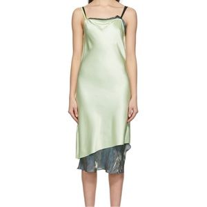 Sleeveless stretch silk satin mid-length dress in green.